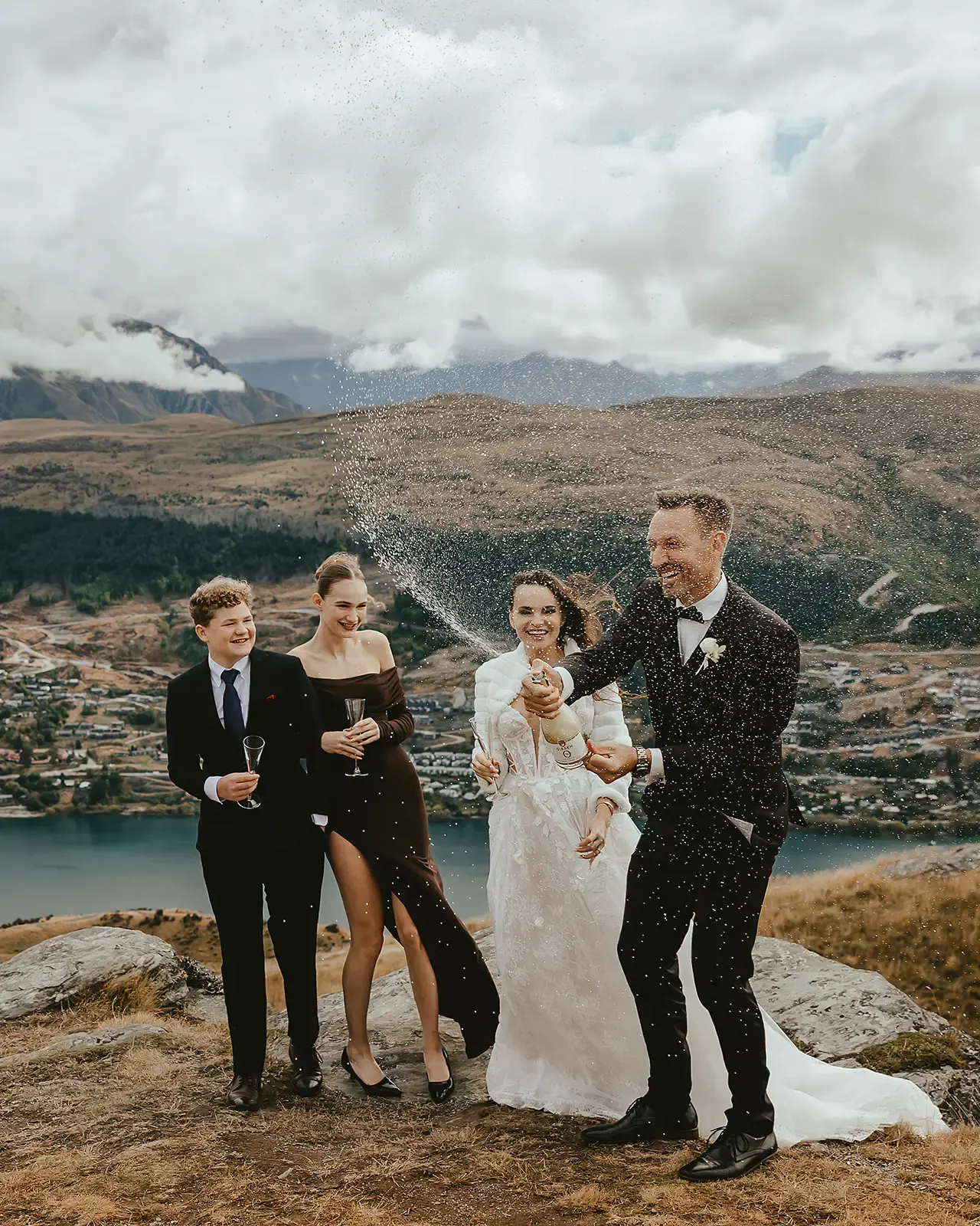 Couple celebrating with champagne at Deer Park Heights