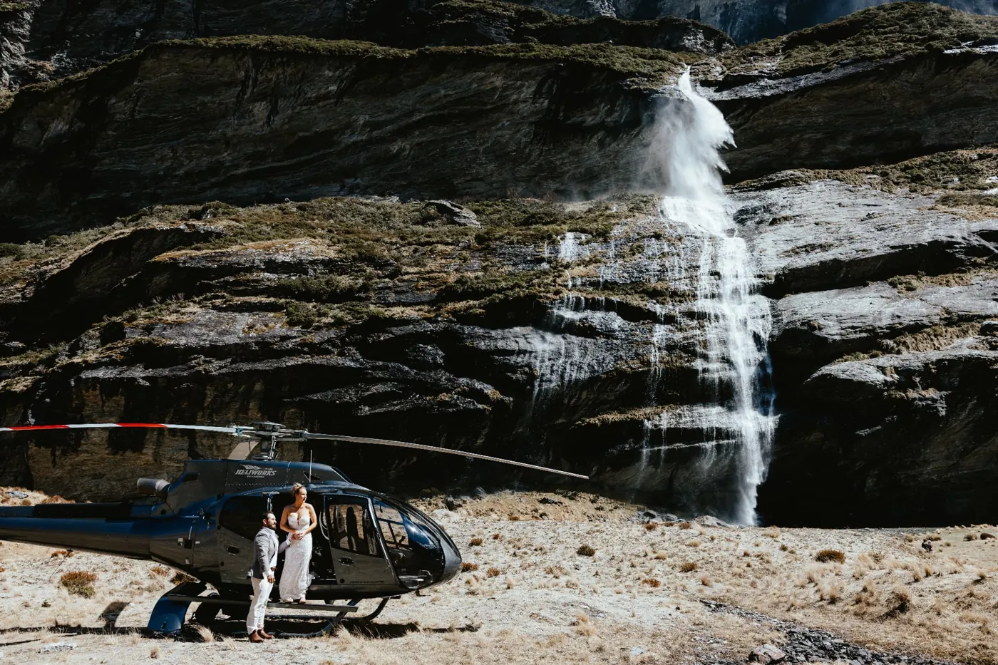 Helicopter landed on the Earnslaw Burn valley floor beneath a waterfall for a wedding.