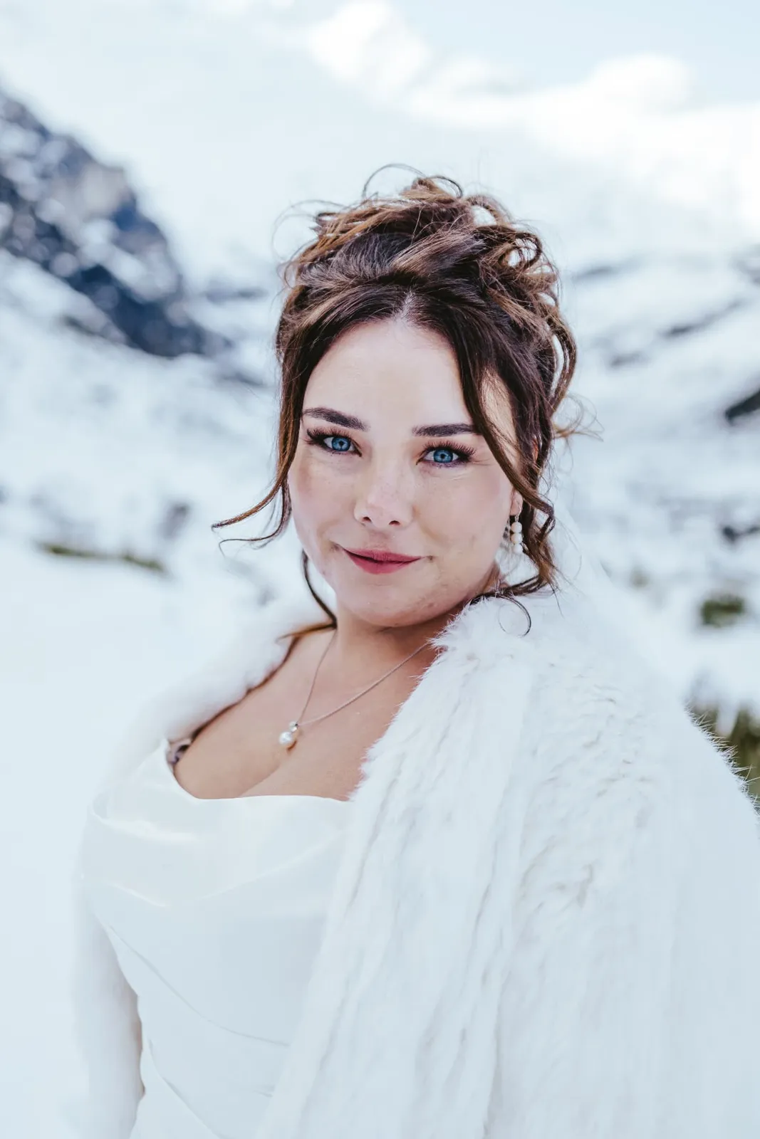 Winter bridal portrait in the snow at Earnslaw Burn, New Zealand