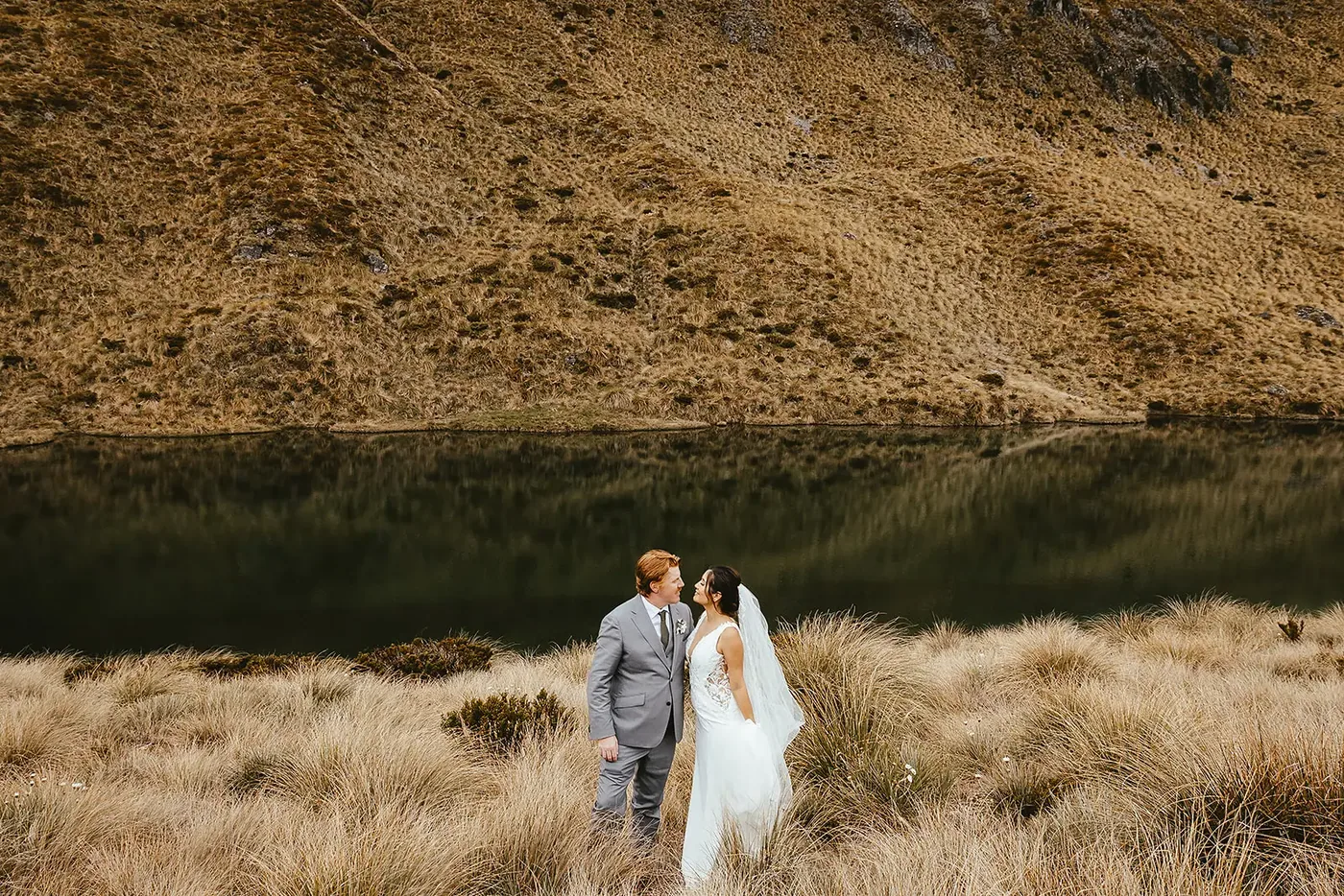 Beside the still alpine tarn at Lake Alta