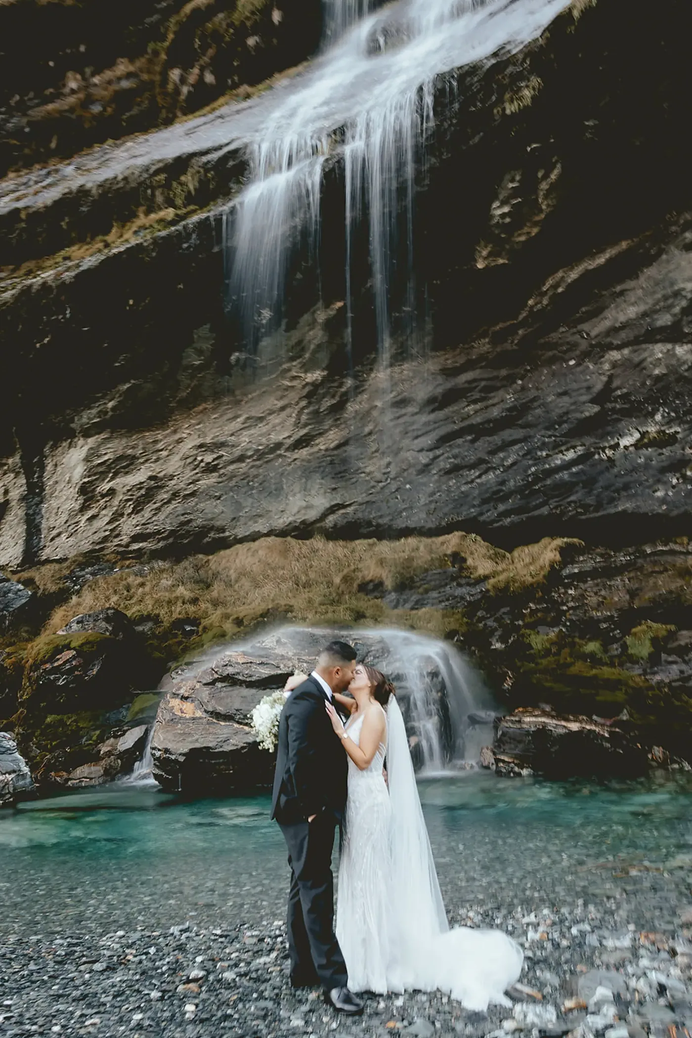 A kiss beside the Earnslaw Burn waterfall.